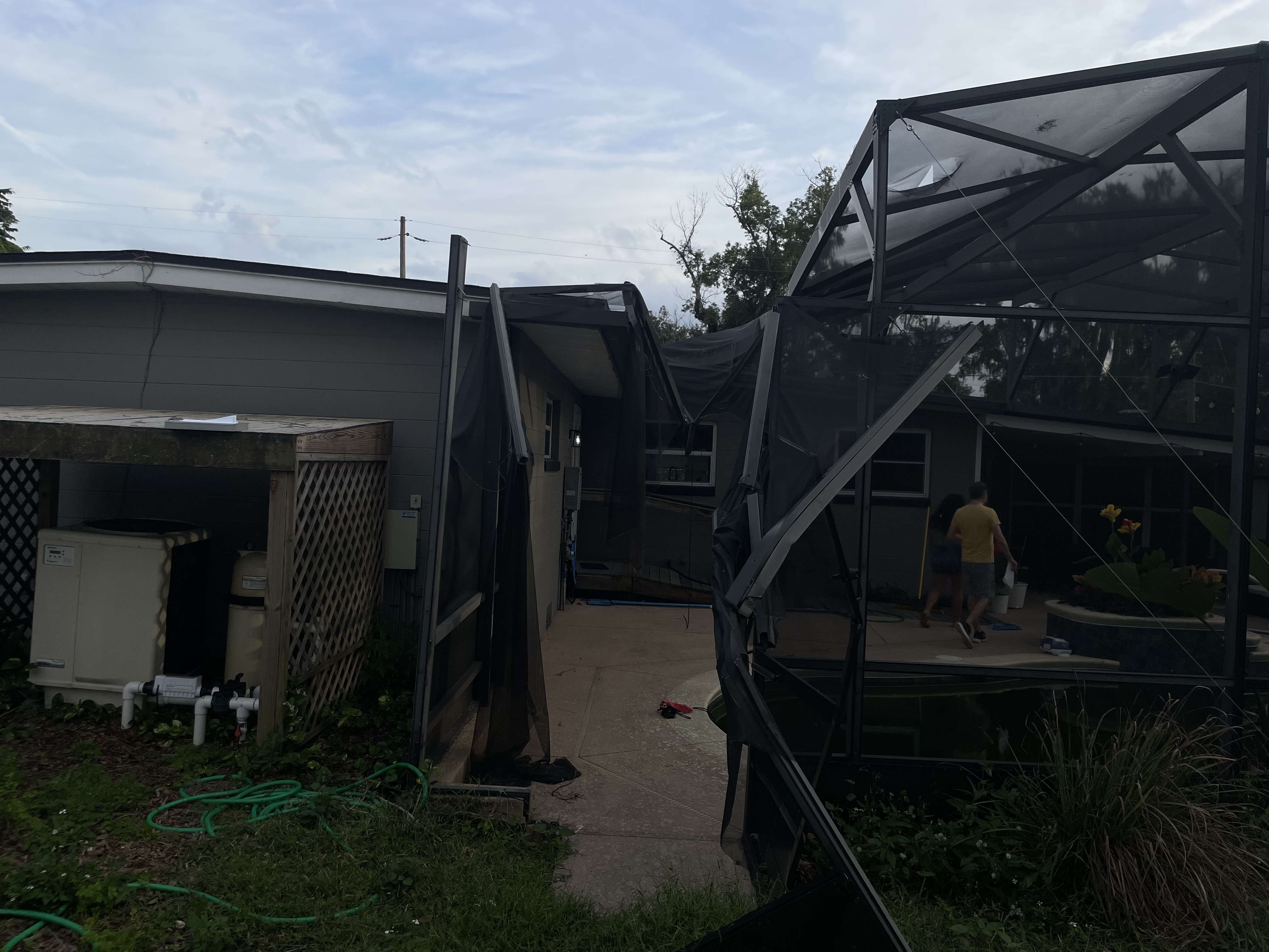 Damaged aluminum enclosure before repair