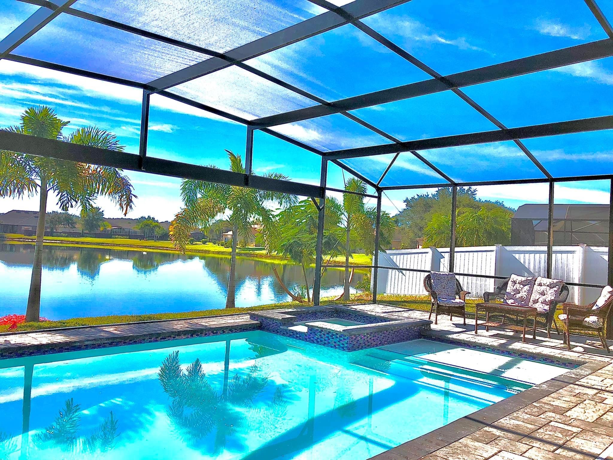 Custom aluminum pool screen enclosure installation in Orlando Florida